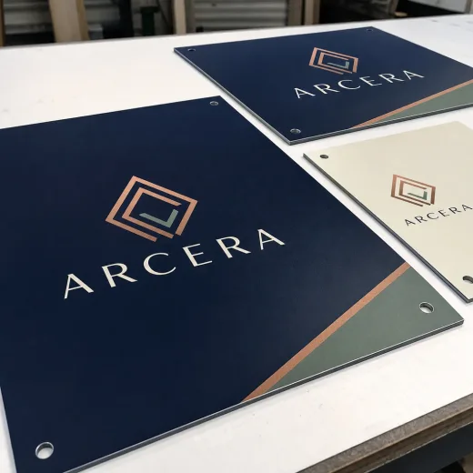 UV-printed aluminium composite sign panels mounted as exterior wayfinding