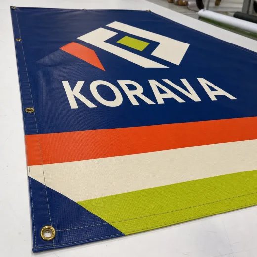 Wide-format outdoor advertising banner printed on roll media